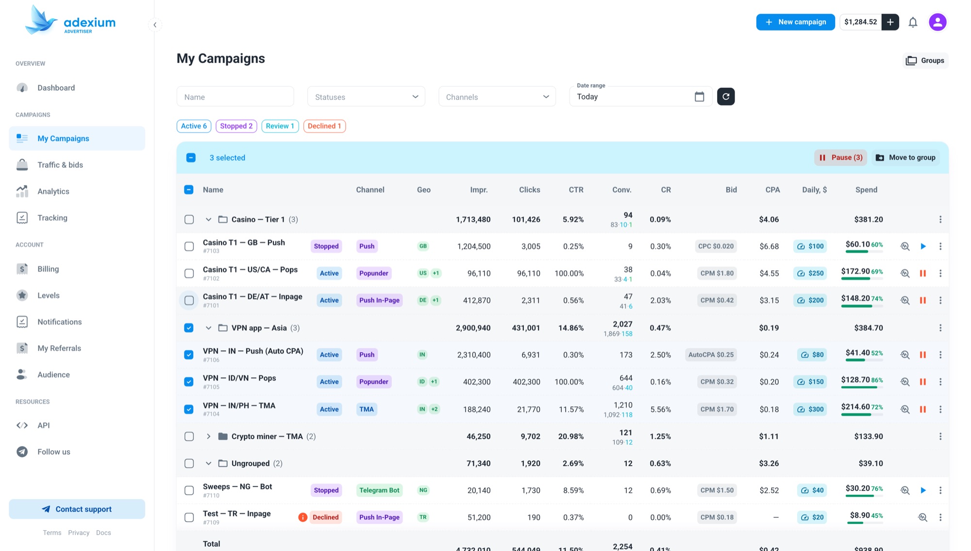 Three campaigns selected with the Pause and Move to group toolbar